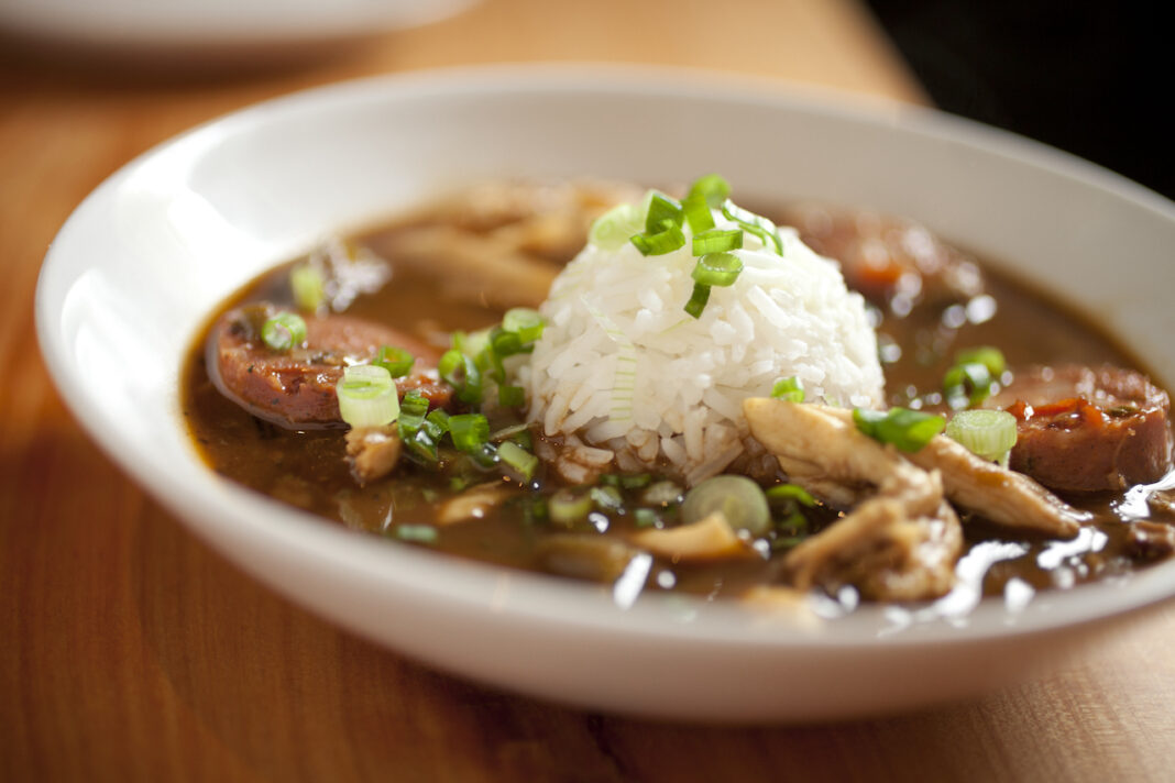 Dinner consisting of chicken gumbo with rice Classic Cajun Chicken & Andouille Gumbo